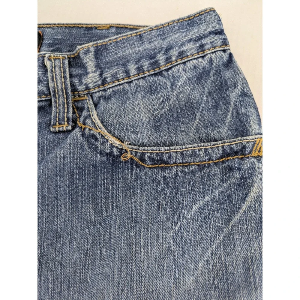 Ariat FR M4 Low Rise Boot Cut Jeans Mens 35x32 Blue Distressed Thrashed Workwear